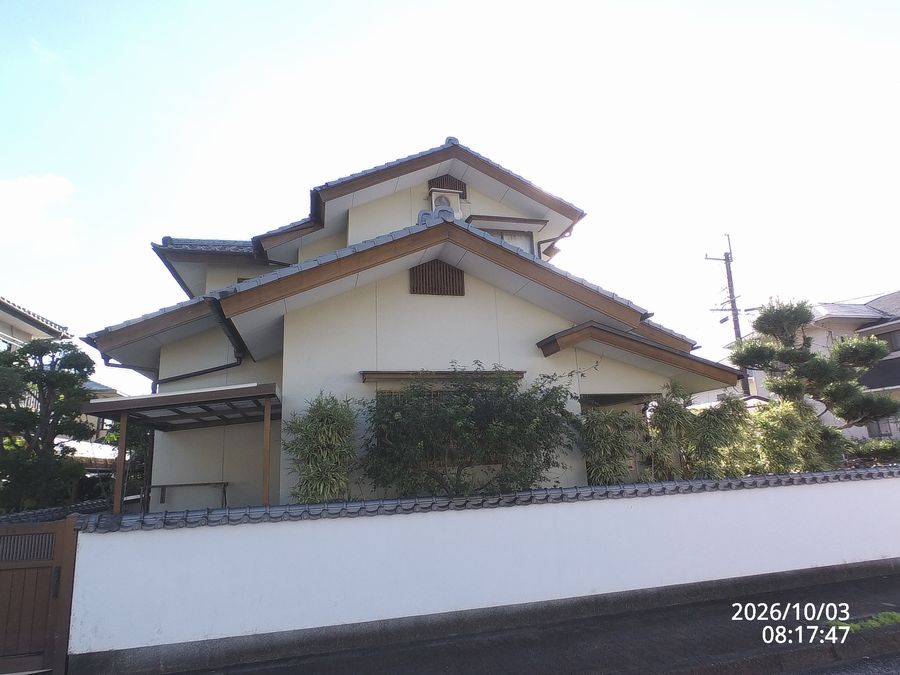 WPステイン塗装から14年後の住宅西面の外観